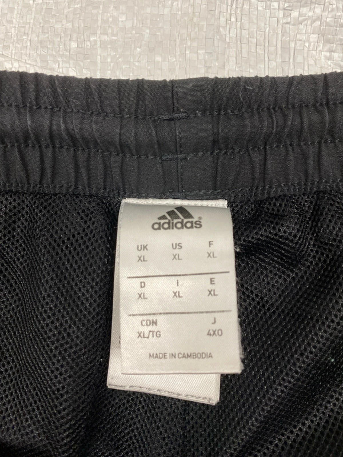 Adidas XL black joggers with blue and white