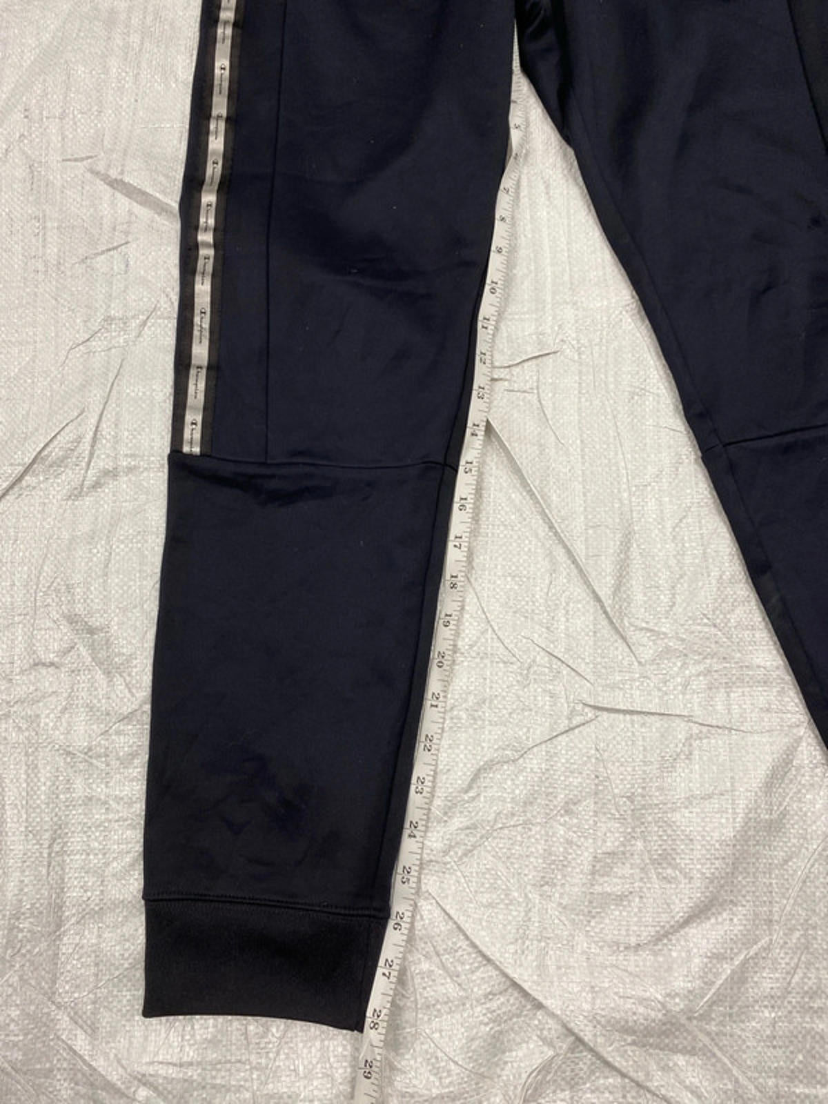 Champion Joggers deep blue leg graphics. Small