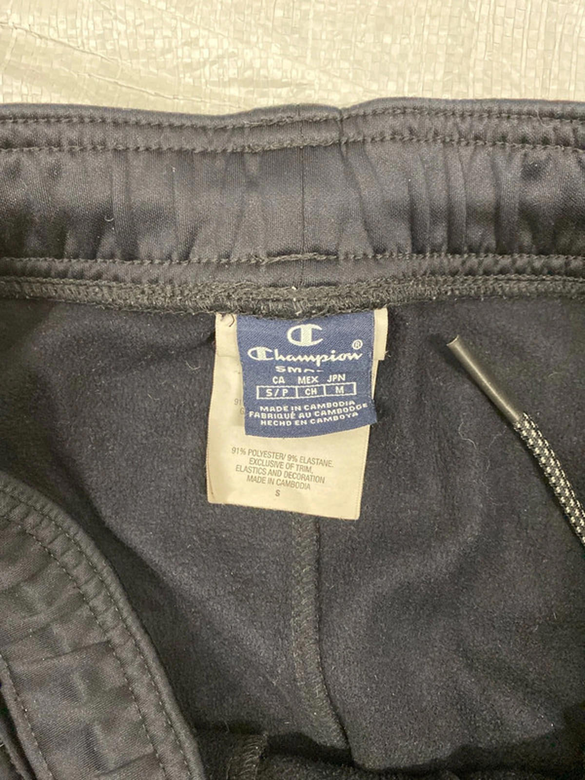 Champion Joggers deep blue leg graphics. Small