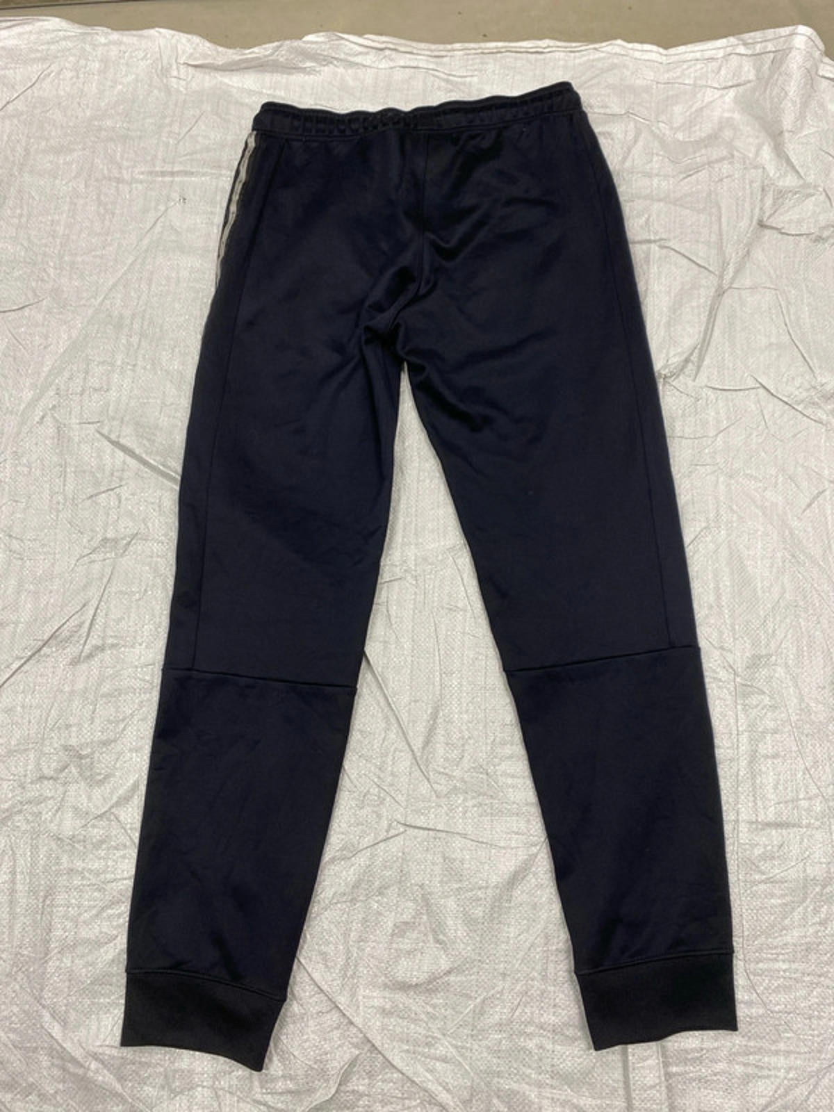 Champion Joggers deep blue leg graphics. Small