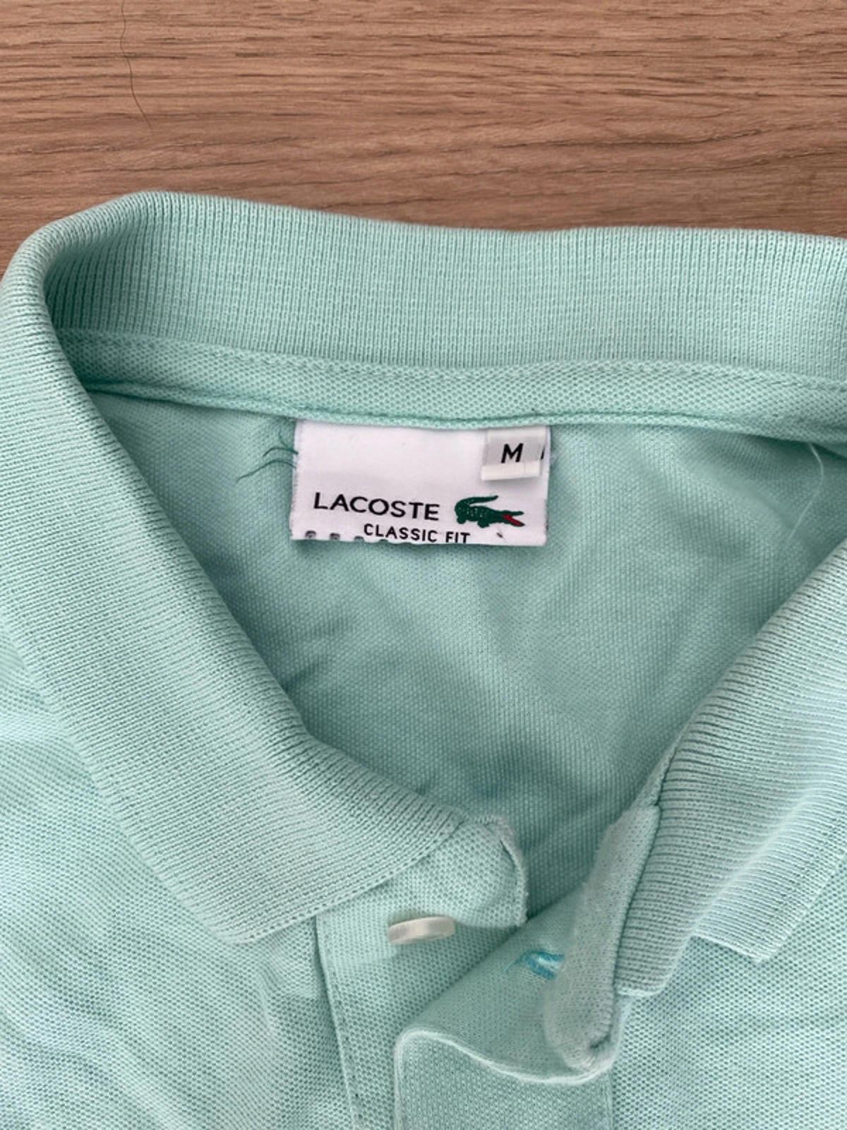 Lacoste mint coloured polo shirt medium