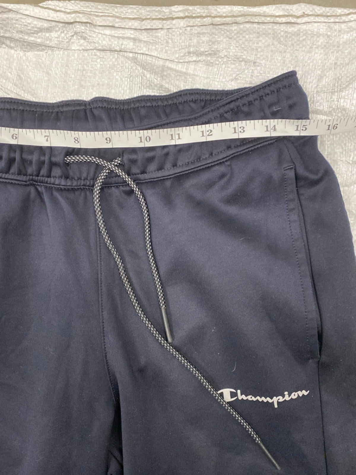 Champion Joggers deep blue leg graphics. Small